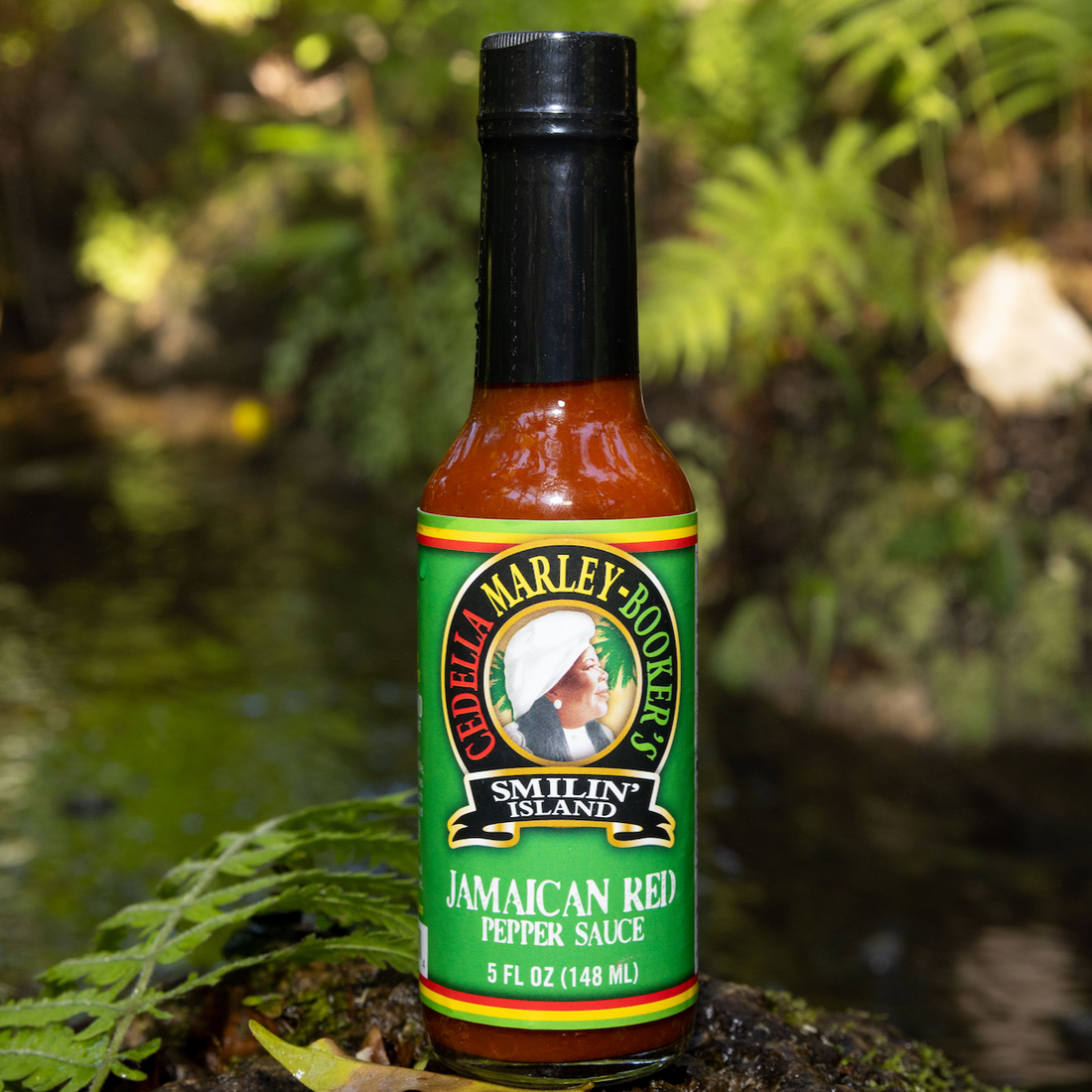 Jamaican Red Hot Sauce Bottle with Habanero and Naga Jolokia Peppers