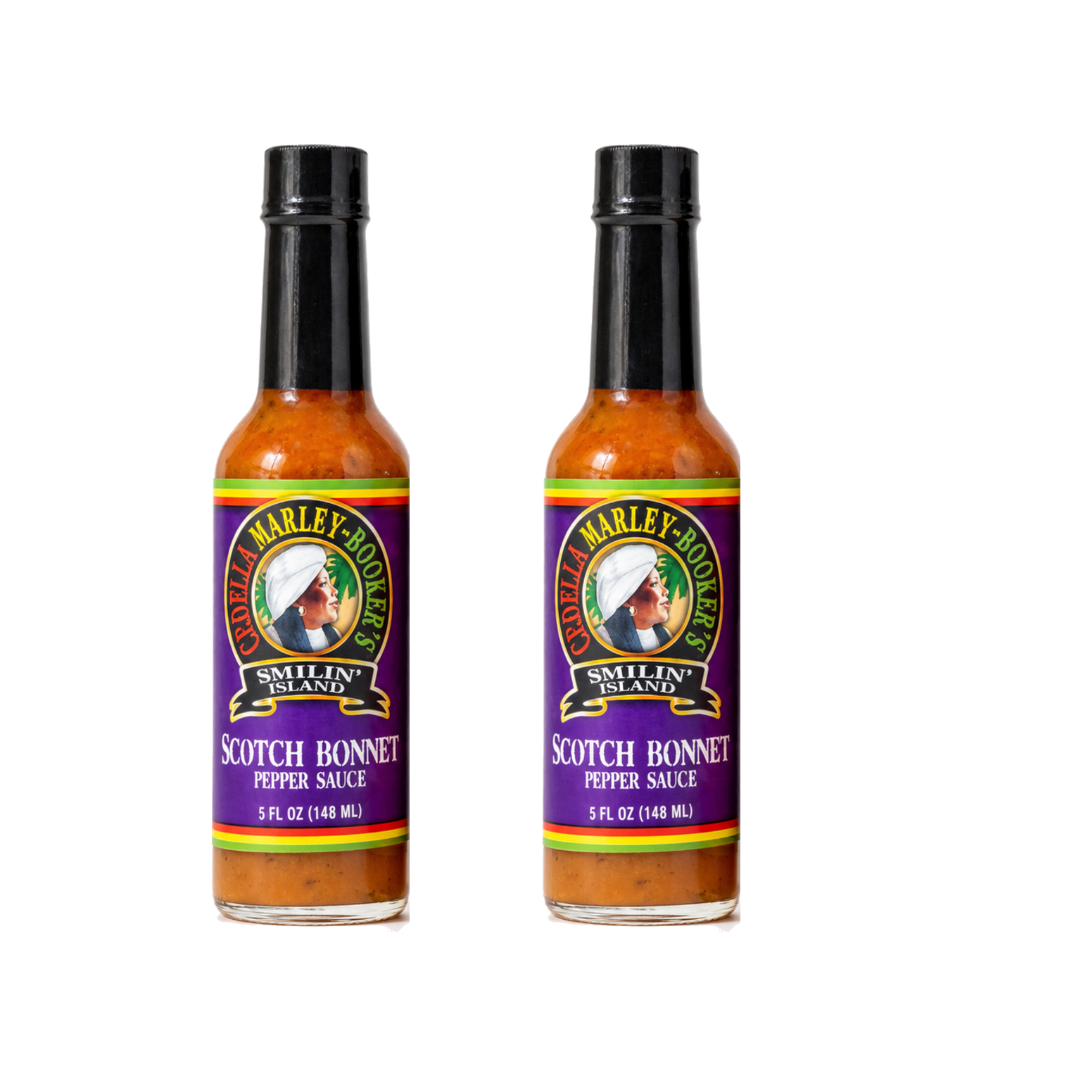 Two bottles of Smilin Island Scotch Bonnet Pepper Sauce on white background